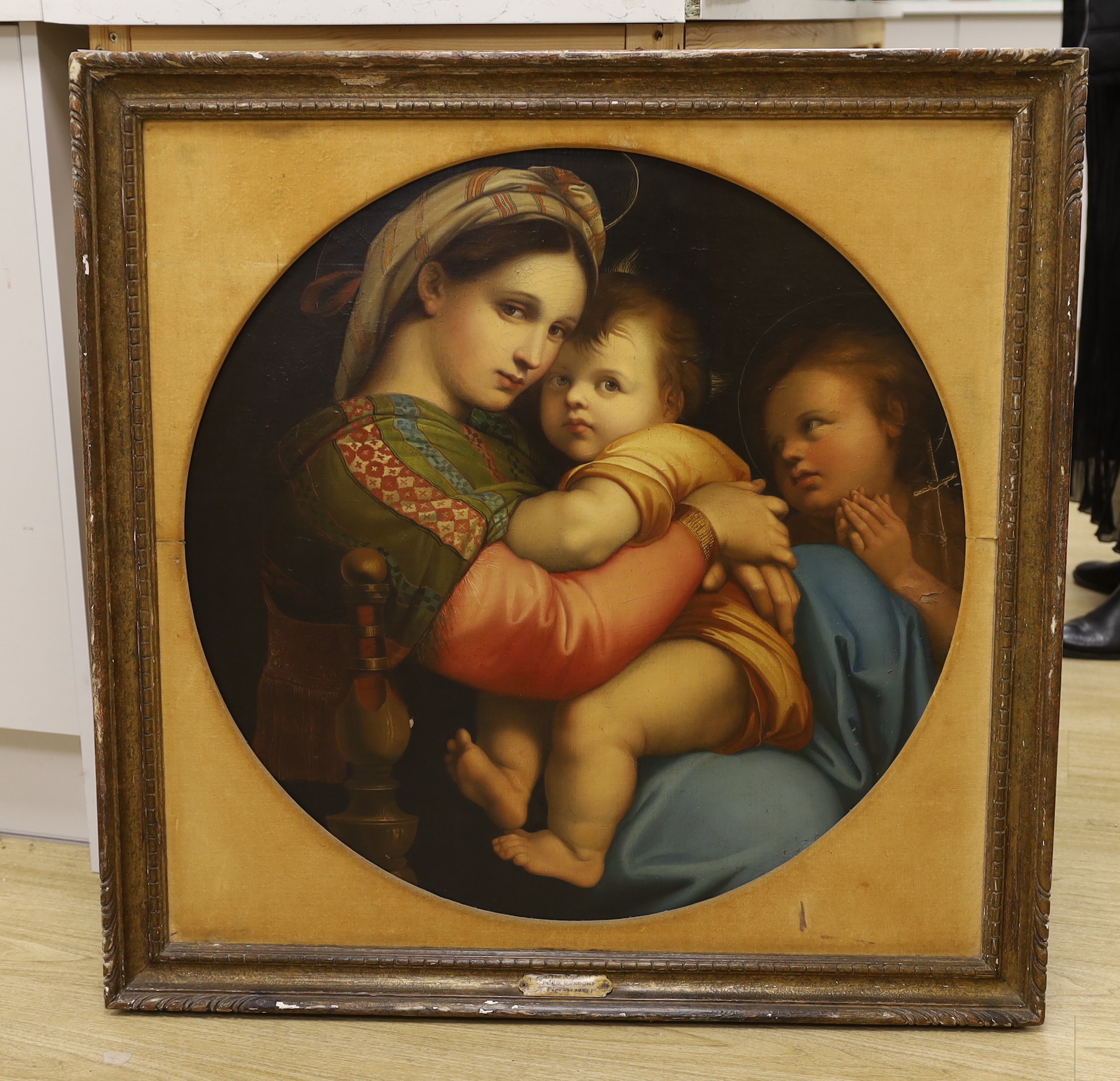 After Raphael (Italian, 1483-1520), oil on canvas, Madonna della Seggiola, applied plaque to the frame After Raphael by Ferd Rondoni, tondo, 69 x 69cm